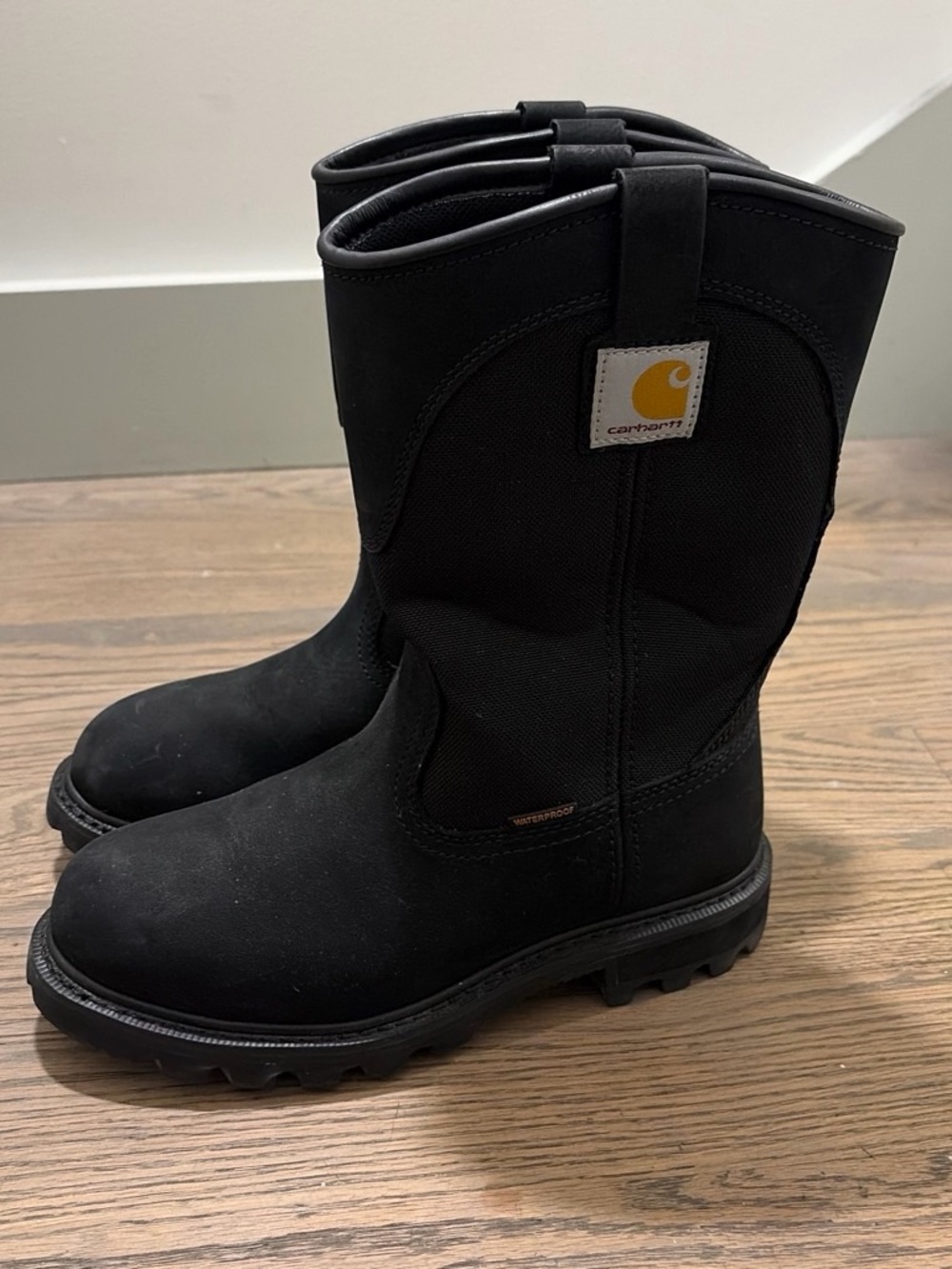 Carhartt woman’s Black Waterproof Pull-On Work Boots with Yellow Logo